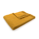 Nachhaltige Kuscheldecke KAMINFEUER mit 40% Alpaka und 45% Schurwolle senf 130x180 cm von Millwa